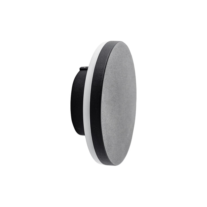 Luminario decorativo circular para muro 8w opción acabado blanco o negro color de luz neutro cálido de Auro