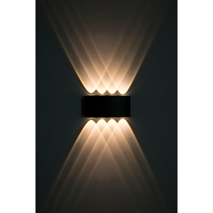Luminario de muro exterior cuatro salidas simétricas directa / indirecta 8W de iLumileds